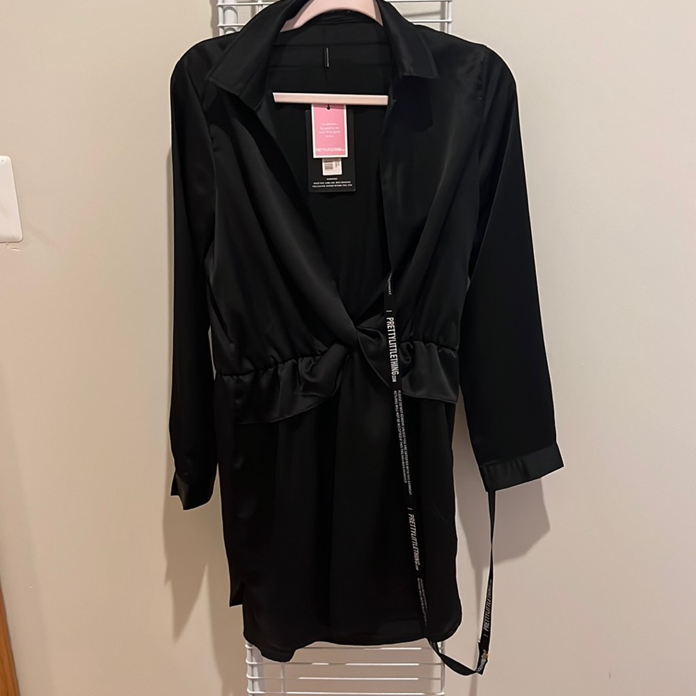 Pretty little thing, the perfect little black dress!! New with tags!!!
